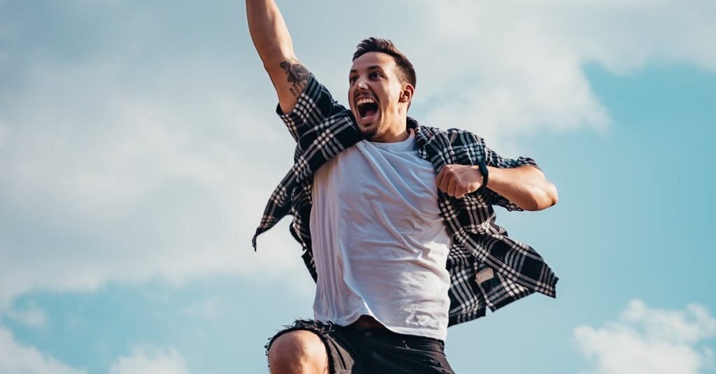 Low Angle Photography of Man Jumping